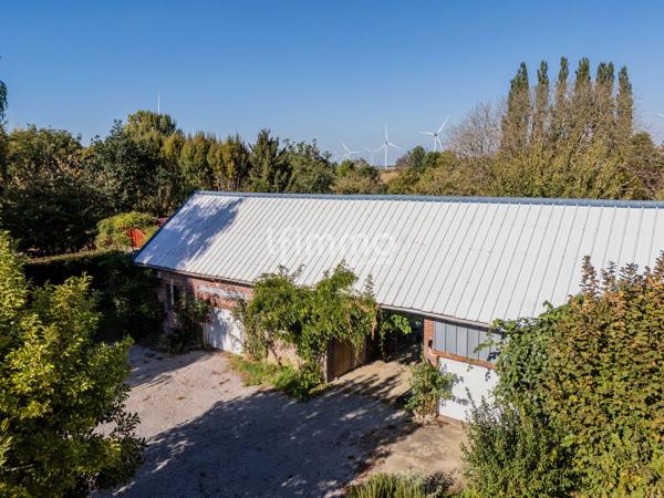 Maison individuelle + Grand garage