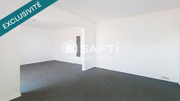 GRAND APPARTEMENT T4 DE 110 M² / PLUSIEURS BALCONS / CAVE / GARAGE EN SUS