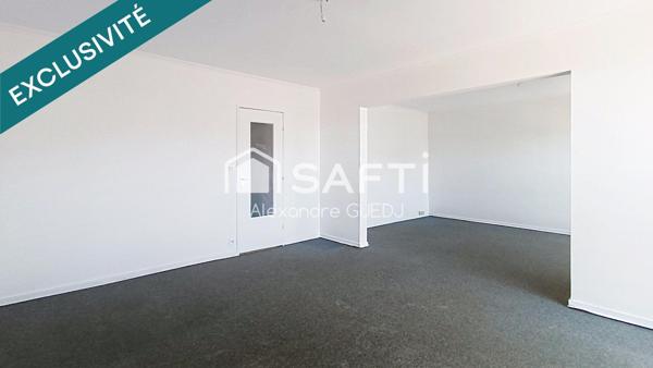 GRAND APPARTEMENT T4 DE 110 M² / PLUSIEURS BALCONS / CAVE / GARAGE EN SUS