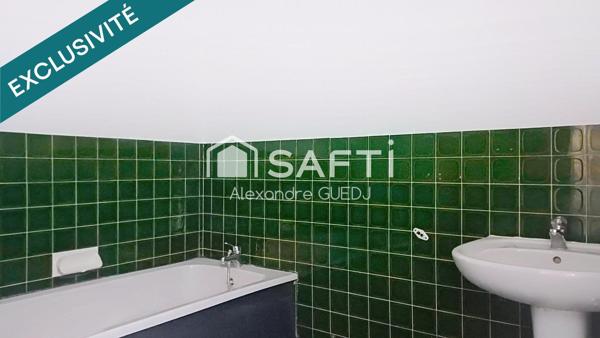 GRAND APPARTEMENT T4 DE 110 M² / PLUSIEURS BALCONS / CAVE / GARAGE EN SUS