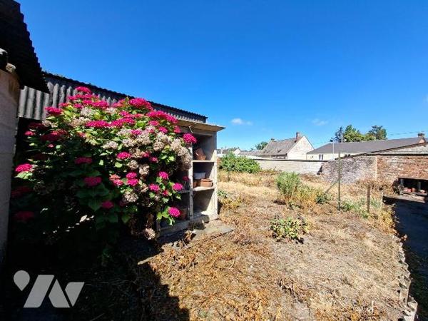 Maison à vendre à SAINS RICHAUMONT, comprenant une cuisine, un séjour, deux chambres communican...