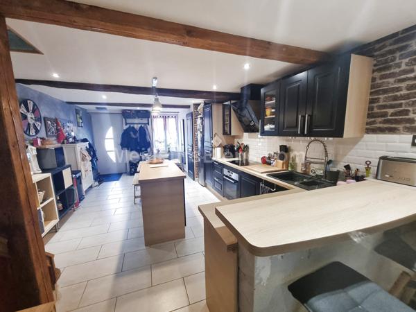 Maison mitoyenne de 130 m2 avec cour