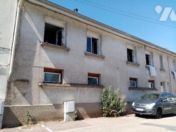 centre Thaon , immeuble mixte 
Un commerce, 3 Logements, une surface à conforter/aménager