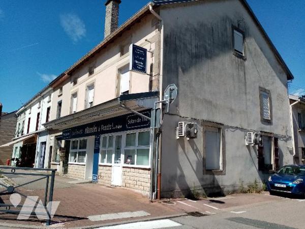 centre Thaon , immeuble mixte 
Un commerce, 3 Logements, une surface à conforter/aménager