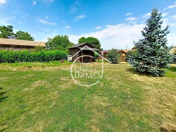 Saint-Pierre-d'Eyraud : Maison de 101m² avec jardin clos et garage