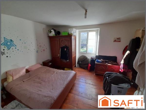 Maison composée de 2 logements, 7 pièces, 5 chambres