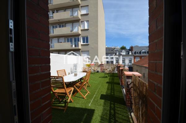 Appartement T2 de 60 m2, cave, terrasse et une place de parking
