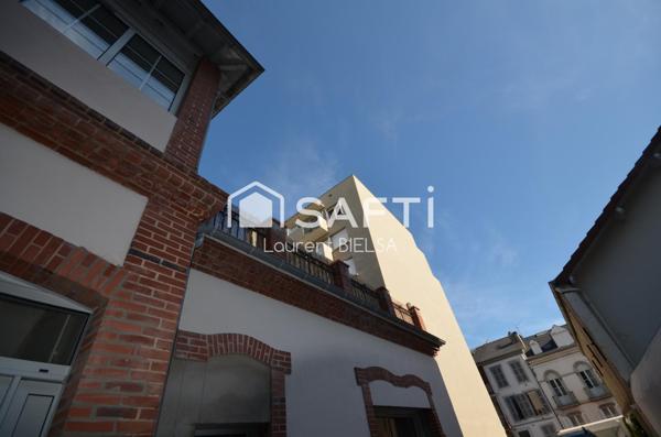 Appartement T2 de 60 m2, cave, terrasse et une place de parking