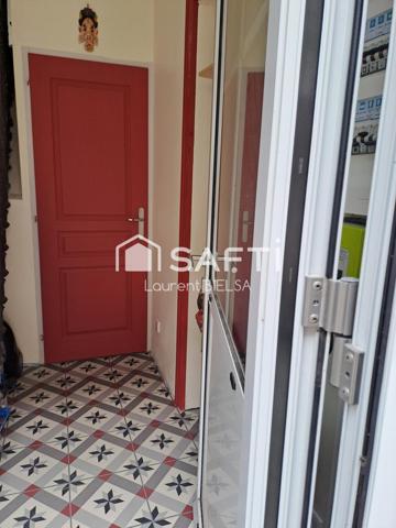 Appartement T2 de 60 m2, cave, terrasse et une place de parking