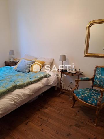 Appartement T2 de 60 m2, cave, terrasse et une place de parking