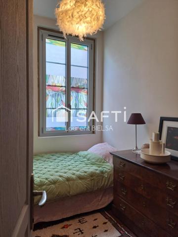 Appartement T2 de 60 m2, cave, terrasse et une place de parking