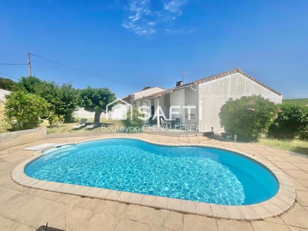 Maison avec 4 chambres, jardin, piscine et garage