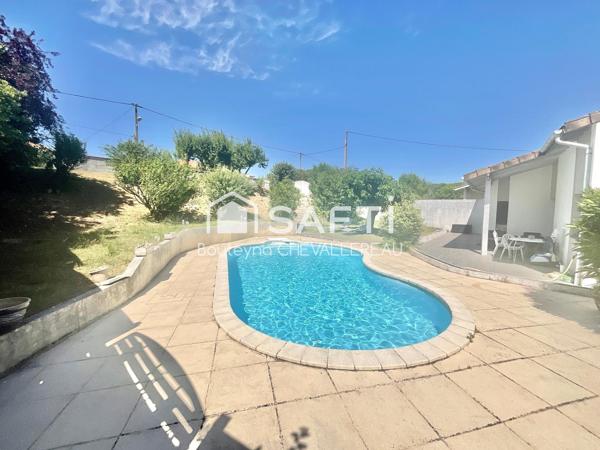 Maison avec 4 chambres, jardin, piscine et garage