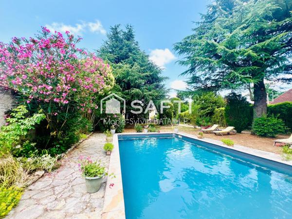 Maison avec garage et piscine