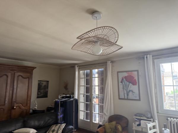 Appartement T4 de caractère avec balcon et vue unique sur la Place des Arcades