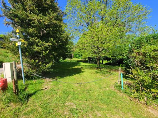 Beau terrain de loisir avec cabanon + caravane – 1 690 m² – calme