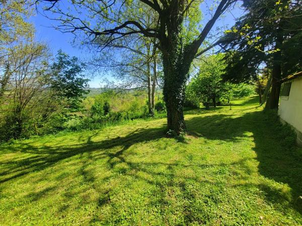 Beau terrain de loisir avec cabanon + caravane – 1 690 m² – calme