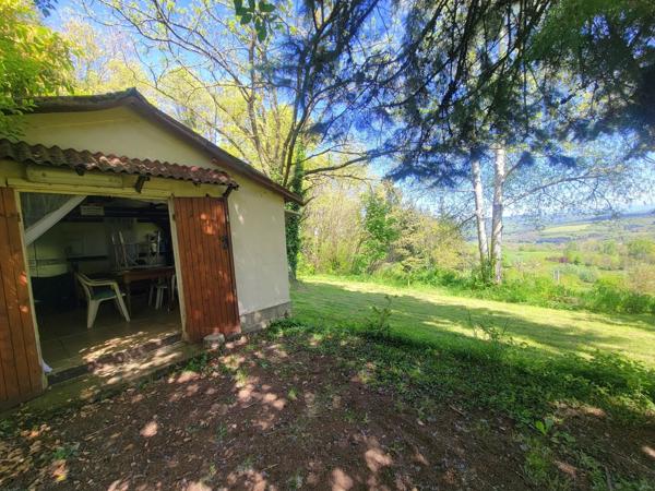 Beau terrain de loisir avec cabanon + caravane – 1 690 m² – calme