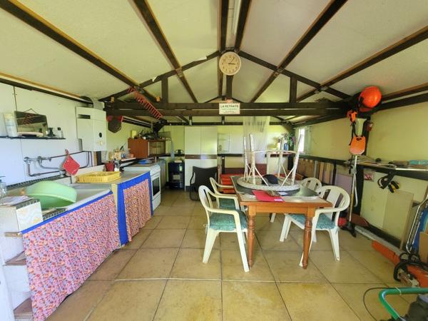 Beau terrain de loisir avec cabanon + caravane – 1 690 m² – calme