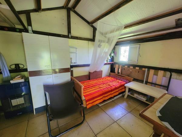 Beau terrain de loisir avec cabanon + caravane – 1 690 m² – calme