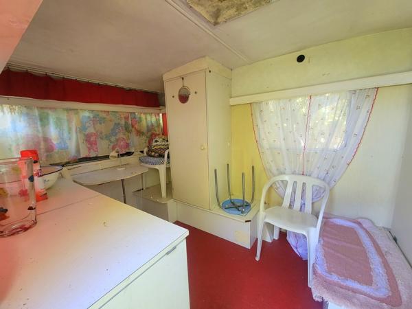Beau terrain de loisir avec cabanon + caravane – 1 690 m² – calme