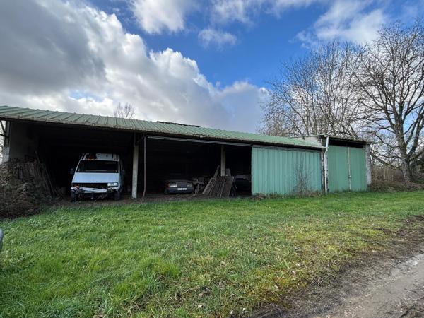 Terrain avec hangar agricole