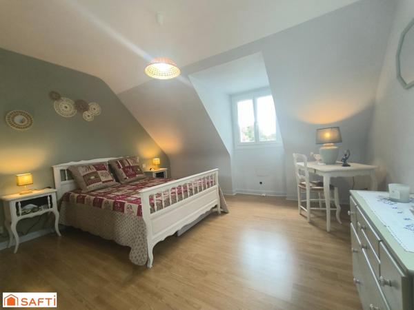 CETTE MAISON A QUELQUES MINUTES DU CENTRE