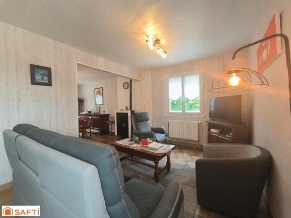 CETTE MAISON A QUELQUES MINUTES DU CENTRE