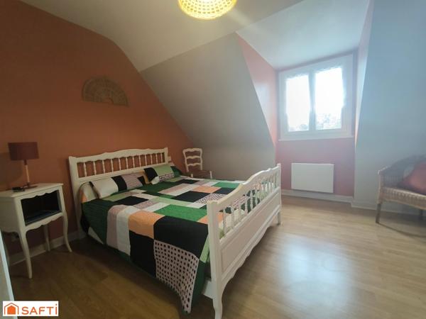 CETTE MAISON A QUELQUES MINUTES DU CENTRE