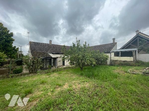 Pavillon au cœur d'un hameau verdoyant