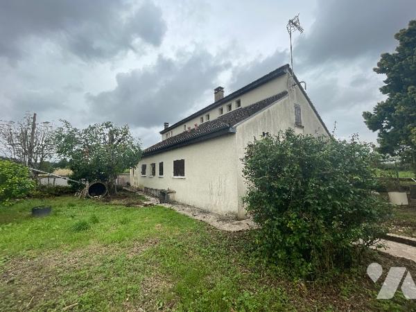 Pavillon au cœur d'un hameau verdoyant