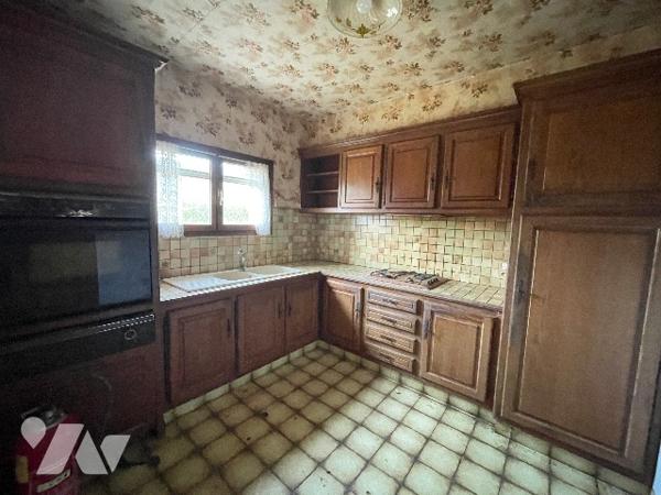 Pavillon au cœur d'un hameau verdoyant