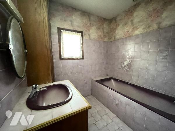 Pavillon au cœur d'un hameau verdoyant