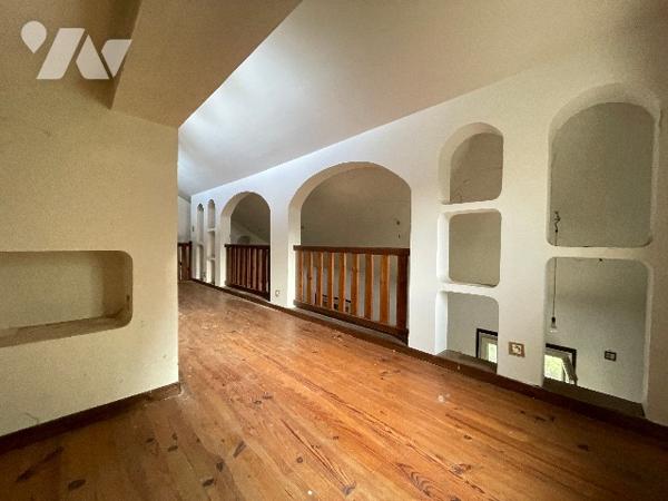 Pavillon au cœur d'un hameau verdoyant