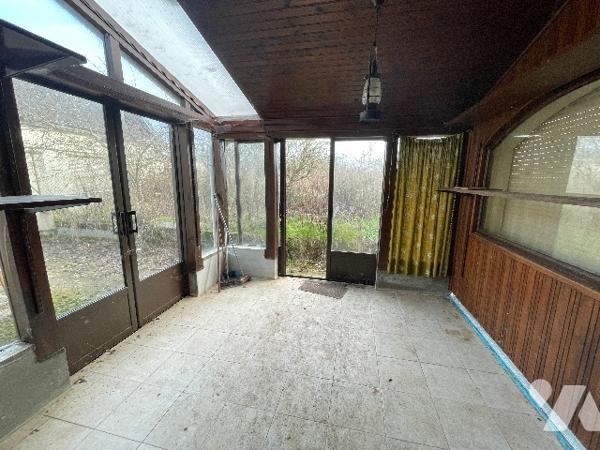 Pavillon au cœur d'un hameau verdoyant