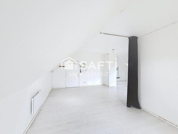 Appartement de 30 m2 avec 2 balcons et place de parking