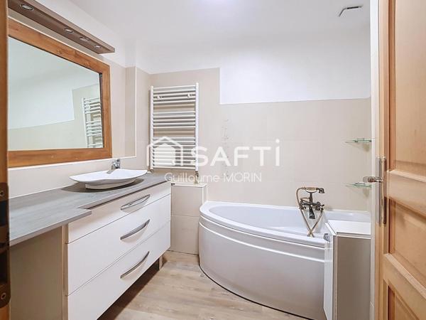 Maison divisée en 2 appartements F2