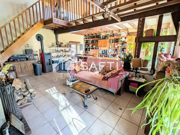 Longère 130 m², 5 pièces, puits, dépendances.