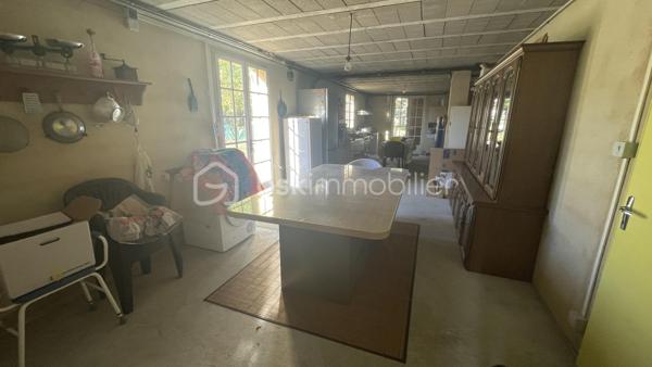 LALINDE – Belle propriété de 200 m² + 150 m² habitable de sous-sol sur 3 128 m² de terrain constructibles, au calme et proche des commerces.
À seulement 5 minutes à pied des commerces, découvrez cette belle propriété offrant de beaux volumes, un environnement calme et un remarquable potentiel d’évolution.
Implantée sur un terrain clos de 3 128 m², cette maison développe environ 200 m² habitables, auxquels s’ajoutent 150 m² de sous-sol. Elle bénéficie de deux accès indépendants, un véritable atout pour profiter pleinement de la propriété et envisager différents projets.
Vous accédez à l’habitation par une grande terrasse offrant une vue dégagée. L’entrée dessert un vaste salon/séjour lumineux de 44 m² avec une cheminée tubée, une cuisine indépendante entièrement équipée, avec son espace repas de 21 m², ainsi que d’un cellier de 8 m².
Ce niveau propose un espace nuit parfaitement préservé, offrant une réelle intimité. Il comprend une grande chambre de 16 m², une salle de bains, un WC indépendant et de nombreux placards.
À l’étage, accessible par un magnifique escalier en bois, vous découvrirez un grand bureau, un débarras, deux belles chambres, un dressing, une salle de bains et un WC indépendant. Cet étage offre de beaux volumes et de nombreuses possibilités d'aménagement selon les besoins de chacun.
Un sous-sol aux multiples possibilités.
Le sous-sol, d’une superficie d’environ 150 m², bénéficie d’une belle hauteur sous plafond et constitue un véritable espace supplémentaire.
Il se compose notamment d’un garage, d’un atelier, d’un bûcher, d’une cave, d’une cuisine d’été, ainsi que de plusieurs autres espaces pouvant être aménagés et utilisés selon vos projets : stockage, bricolage, loisirs, salle de sport ou autres besoins.
Un terrain rare et à fort potentiel
À l’extérieur, vous profiterez d’un terrain entièrement clos, soigneusement aménagé et parfaitement entretenu, agrémenté d’arbres fruitiers et d’une truffière.
Autre atout majeur : l’intégralité de la parcelle est constructible. Son second accès indépendant permet d’envisager la réalisation de nouvelles constructions et offre la possibilité de les raccorder au réseau d’assainissement collectif.
Cette configuration ouvre ainsi de nombreuses perspectives : projet familial, construction supplémentaire, création d’un logement indépendant ou encore valorisation d’une partie du terrain, sous réserve des autorisations d’urbanisme applicables.
Des équipements confortables
La maison bénéficie notamment des équipements suivants :
Portail motorisé
Adoucisseur d’eau
Pompe à chaleur assurant le chauffage par radiateurs et la production d’eau chaude
Menuiseries PVC double vitrage de qualité, installées par un entrepreneur local réputé
Une cheminée tubée 
À noter : l’assainissement individuel actuellement en place est non conforme.
Un emplacement privilégié
Située dans un environnement calme, tout en étant à seulement 5 minutes à pied des commerces de Lalinde, cette propriété en parfait état, avec ses 200 m² habitables, son sous-sol de 150 m², son vaste terrain clos et constructible, ses deux accès indépendants et son potentiel d’évolution, offre de nombreuses possibilités pour un projet de vie ou un investissement patrimonial.
Visite 7 jours sur 7. Collaboration entre professionnels de l'immobilier, bienvenue.

LALINDE – Beautiful property of 200 m2 + 150 m2 basement on 3 128 m2 buildable, quiet and close to shops.
Just 5 minutes walk from the shops, discover this beautiful property offering beautiful volumes, a quiet environment and a remarkable potential for development.
Implanted on a closed ground of 3 128 m 2, this house develops approximately 200 m 2 habitable, to which are added 150 m 2 of basement. It has two independent access, a real asset to take full advantage of the property and consider different projects.
You access the house by a large terrace with an unobstructed view. The entrance serves a large bright living room/ stay of 44 m 2 with a chimney tubed, an independent kitchen entirely equipped, with its space meal of 21 m 2, as well as a cellar of 8 m 2.
This level offers a perfectly preserved sleeping area, offering real privacy. It includes a large bedroom of 16 m 2, a bathroom, a separate toilet and many closets.
Upstairs, accessible by a magnificent wooden staircase, you will discover a large office, a storage room, two beautiful bedrooms, a dressing room, a bathroom and a separate toilet. This floor offers beautiful volumes and many possibilities of development according to the needs of each one.
A basement with multiple possibilities.
The basement, with an area of about 150 m 2, has a high ceiling and is a real additional space.
It consists in particular of a garage, a workshop, a pyre, a cellar, a summer kitchen, as well as several other spaces that can be arranged and used according to your projects: storage, DIY, leisure, gym or other needs.
A rare land with strong potential
Outside, you will enjoy a fully enclosed land, carefully landscaped and perfectly maintained, decorated with fruit trees and a truffle.
Another major advantage: the entire plot is constructible. Its second independent access makes it possible to consider the construction of new constructions and offers the possibility of connecting them to the collective sewerage network.
This configuration thus opens up many opportunities: family project, additional construction, creation of an independent dwelling or even the development of part of the land, subject to the applicable urban planning permits.
Comfortable equipment
The house benefits in particular from the following facilities:
Motorized gate
Water softener
Heat pump for radiator heating and hot water production
Quality double-glazed PVC joinery, installed by a reputable local contractor
A tubular fireplace 
Note: the individual sanitation currently in place is non-compliant.
A privileged location
Located in a quiet environment, while being only 5 minutes walk from the shops of Lalinde, this property in perfect condition, with its 200 m2 living space, its basement of 150 m 2, its vast enclosed and building land, its two independent access and its potential for development, offers many possibilities for a life project or a heritage investment.
Visit 7 days a week. Collaboration between real estate professionals, welcome.