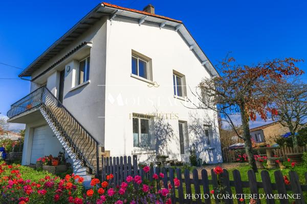 AGRÉABLE MAISON FAMILIALE AVEC APPARTEMENT - A 700m DE LA PLAGE -