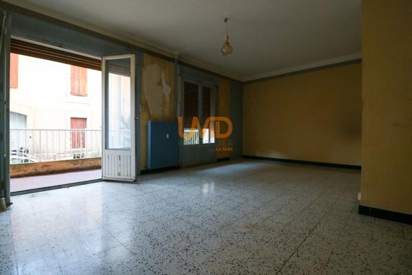 Appartement de 57 m² avec balcon, proche du centre-ville de Nîmes