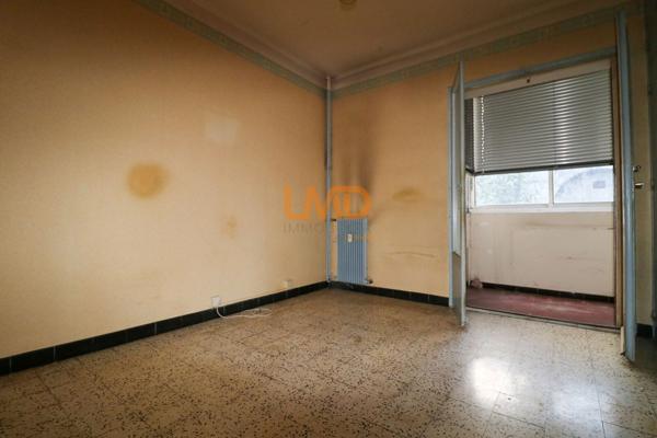 Appartement de 57 m² avec balcon, proche du centre-ville de Nîmes