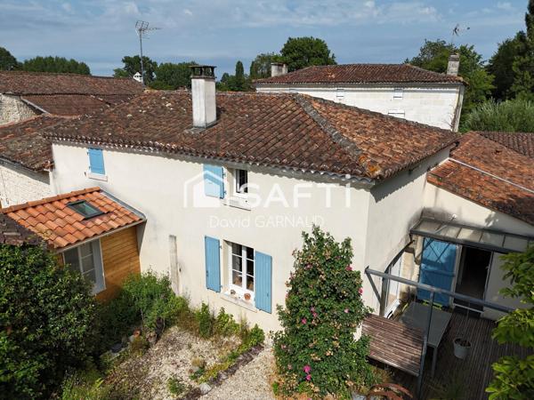 Maison à la campagne avec seconde habitation et un atelier.