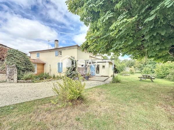 Maison à la campagne avec seconde habitation et un atelier.