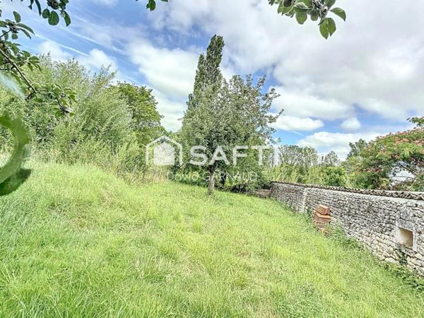 Maison à la campagne avec seconde habitation et un atelier.