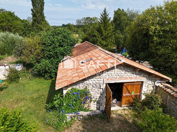 Maison à la campagne avec seconde habitation et un atelier.