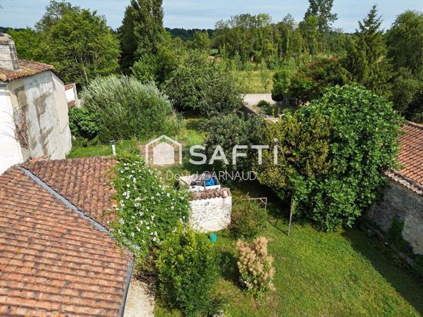 Maison à la campagne avec seconde habitation et un atelier.