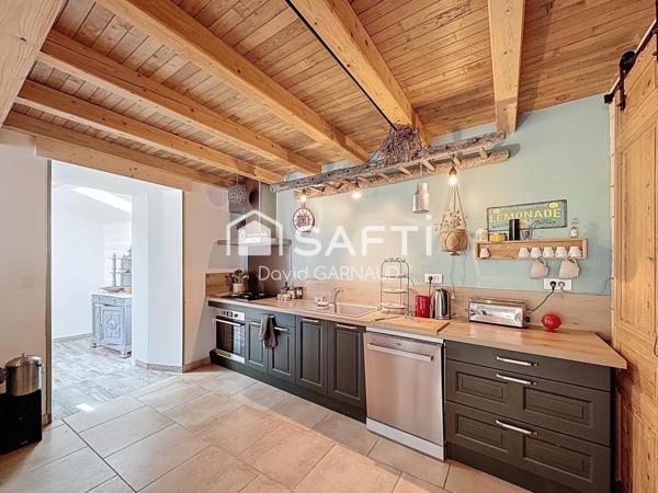 Maison à la campagne avec seconde habitation et un atelier.