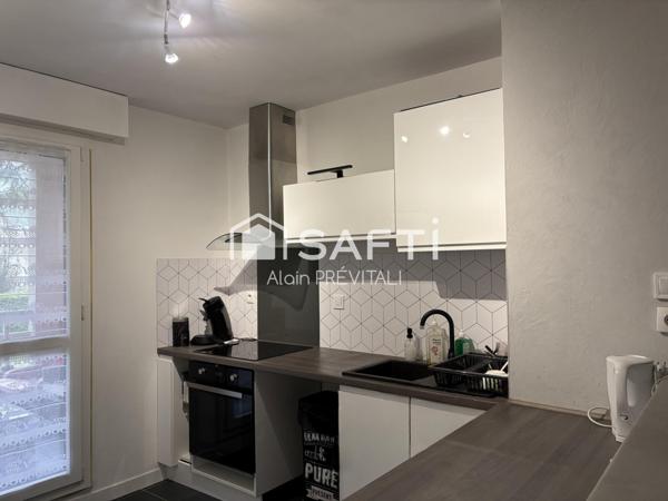 Appartement comprenant une terrasse, un garage et une cave
