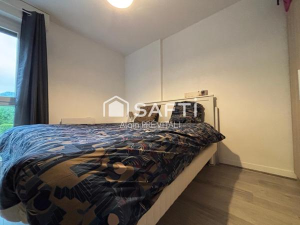Appartement comprenant une terrasse, un garage et une cave